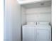 A closet features a stacked washer and dryer at 45 Maleena Mesa St # 223, Henderson, NV 89074