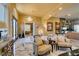 Grand entryway with marble floors, a statement chandelier, and elegant decor at 4702 Blue Mesa Way, Las Vegas, NV 89129