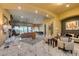 Elegant living room with marble floors, high ceilings, and designer furniture at 4702 Blue Mesa Way, Las Vegas, NV 89129