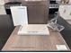Display of kitchen finishes, including cabinetry and flooring options at 4748 Parkarbor Ave, Las Vegas, NV 89141