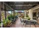 Covered patio with dining area and lights at 4920 Rancho Bernardo Way, Las Vegas, NV 89130