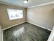 Bright bedroom with gray tile floors and large window at 501 S Maryland Pkwy # B14, Las Vegas, NV 89101
