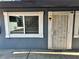 Building exterior showcasing a unit's entrance with security door at 501 S Maryland Pkwy # B14, Las Vegas, NV 89101