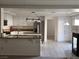 Modern kitchen with white cabinets and granite countertops at 502 Pale Pueblo Ct, Las Vegas, NV 89183