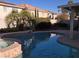 Inviting pool with spa and covered patio at 502 Pale Pueblo Ct, Las Vegas, NV 89183