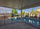 Relaxing pool area with safety fence and patio at 502 Pale Pueblo Ct, Las Vegas, NV 89183