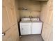 Stackable washer and dryer in a dedicated laundry closet at 5350 River Glen Dr # 307, Las Vegas, NV 89103