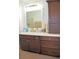 Elegant bathroom with dark wood cabinets and updated fixtures at 5402 Cross Meadows Ln, Las Vegas, NV 89122