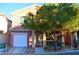 Two-story house with attached garage and landscaped front yard at 5402 Cross Meadows Ln, Las Vegas, NV 89122