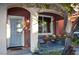 Small front porch with seating and potted plants at 5402 Cross Meadows Ln, Las Vegas, NV 89122
