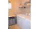 Laundry room with washer, dryer, and ample storage at 5402 Cross Meadows Ln, Las Vegas, NV 89122