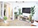 Spacious living room with large TV and cozy seating at 5402 Cross Meadows Ln, Las Vegas, NV 89122