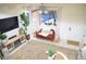 Bright living room with large windows and comfy couch at 5402 Cross Meadows Ln, Las Vegas, NV 89122