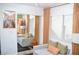 Bright home office with comfortable seating and natural light at 5402 Cross Meadows Ln, Las Vegas, NV 89122