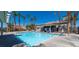 Community pool with lounge chairs at 5402 Cross Meadows Ln, Las Vegas, NV 89122
