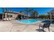 Community pool with lounge chairs at 5402 Cross Meadows Ln, Las Vegas, NV 89122