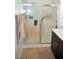 Clean shower with glass enclosure and plenty of storage at 5402 Cross Meadows Ln, Las Vegas, NV 89122