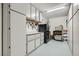 Garage with built-in cabinets and workbench at 5627 Felicity Cir, Las Vegas, NV 89139