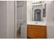Simple bathroom with wood vanity and toilet at 6005 Bristol Crest Ln, Las Vegas, NV 89139