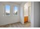 Well-lit bedroom featuring a built-in vanity and access to a bathroom at 6005 Bristol Crest Ln, Las Vegas, NV 89139