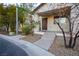 Front entry with stairs, landscaping, and rock pathway at 6005 Bristol Crest Ln, Las Vegas, NV 89139