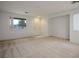 Open living area with neutral decor and carpet at 6005 Bristol Crest Ln, Las Vegas, NV 89139