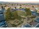 An aerial view of a neighborhood park with surrounding houses at 6005 Bristol Crest Ln, Las Vegas, NV 89139