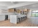 Modern kitchen with island, stainless steel appliances, and ample counter space at 8645 Edmond St, Las Vegas, NV 89139