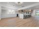 Open concept kitchen featuring white cabinetry and a large island at 8645 Edmond St, Las Vegas, NV 89139