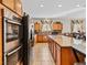 Kitchen with stainless steel appliances at 8811 Pauley Hills St, Las Vegas, NV 89131