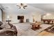 Relaxing living room with comfortable seating and a pool table at 8811 Pauley Hills St, Las Vegas, NV 89131