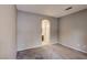 Well-lit bedroom with grey walls and carpet, and access to bathroom at 9000 Las Vegas Blvd # 2134, Las Vegas, NV 89123