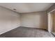 Spacious bedroom with neutral walls and carpet, plus a sliding glass door at 9000 Las Vegas Blvd # 2134, Las Vegas, NV 89123