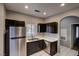Stainless steel appliances and dark wood cabinets at 9000 Las Vegas Blvd # 2134, Las Vegas, NV 89123