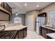 Dark wood cabinets, stainless steel appliances, and white counters at 9000 Las Vegas Blvd # 2134, Las Vegas, NV 89123