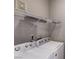 Laundry room with washer, dryer, and shelving at 9000 Las Vegas Blvd # 2134, Las Vegas, NV 89123