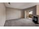 Living room with fireplace, sliding glass door, and carpet at 9000 Las Vegas Blvd # 2134, Las Vegas, NV 89123