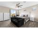 Main bedroom with king bed, private balcony, and ample closet space at 9622 Aqua Harbor Way, Las Vegas, NV 89178