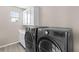 Laundry room with modern washer and dryer at 9622 Aqua Harbor Way, Las Vegas, NV 89178