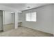 Bedroom with mirrored closet doors and built-in shelving at 10082 Swimming Hole St, Las Vegas, NV 89183