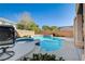 Inviting pool and spa with landscaping at 10150 Timber Willow Ave, Las Vegas, NV 89135