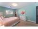 Charming bedroom with light walls and comfortable bedding at 10444 Britton Hill Ave, Las Vegas, NV 89129