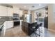 Spacious kitchen with island, stainless steel appliances, and granite countertops at 10444 Britton Hill Ave, Las Vegas, NV 89129