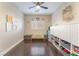 Playroom with toy storage, a ceiling fan, and lots of natural light at 10444 Britton Hill Ave, Las Vegas, NV 89129