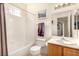 Clean bathroom with tub, toilet and vanity at 108 Breezy Tree Ct # 202, Las Vegas, NV 89145