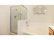 Clean bathroom with shower and tub at 108 Breezy Tree Ct # 202, Las Vegas, NV 89145