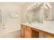 Bathroom features a large vanity, soaking tub, and shower at 108 Breezy Tree Ct # 202, Las Vegas, NV 89145