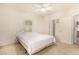 Bedroom with ceiling fan and access to bathroom and closet at 108 Breezy Tree Ct # 202, Las Vegas, NV 89145