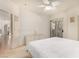 Spacious bedroom with large bed and access to balcony at 108 Breezy Tree Ct # 202, Las Vegas, NV 89145