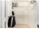 Walk-in closet with wire shelving and hanging rods at 108 Breezy Tree Ct # 202, Las Vegas, NV 89145